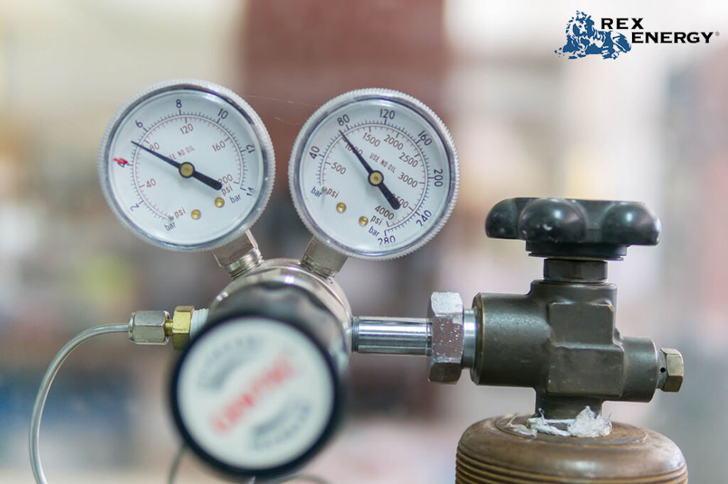 use pressure gauge to check tank level